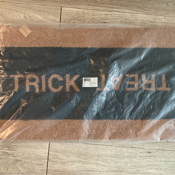 New Halloween trick or treat door mat
